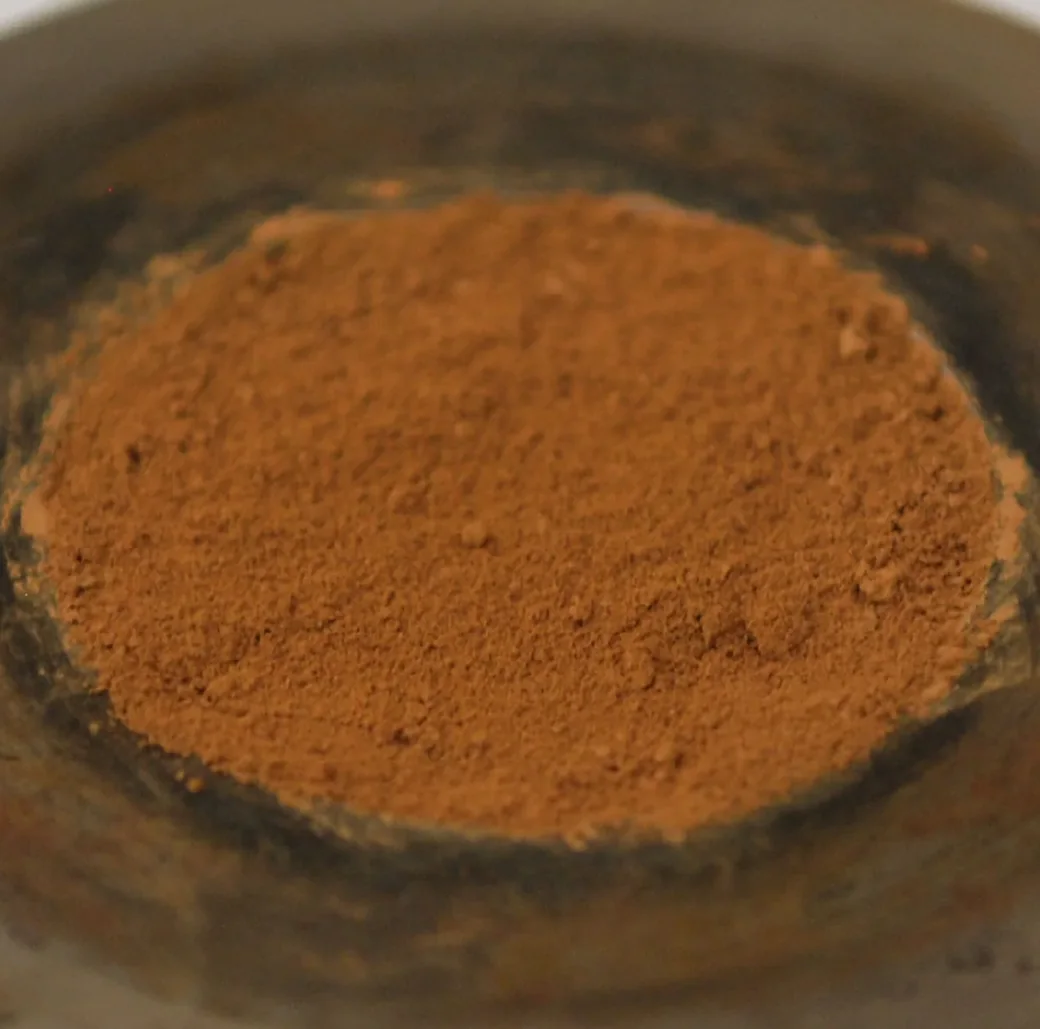 Laboratory analog of Martian red dust